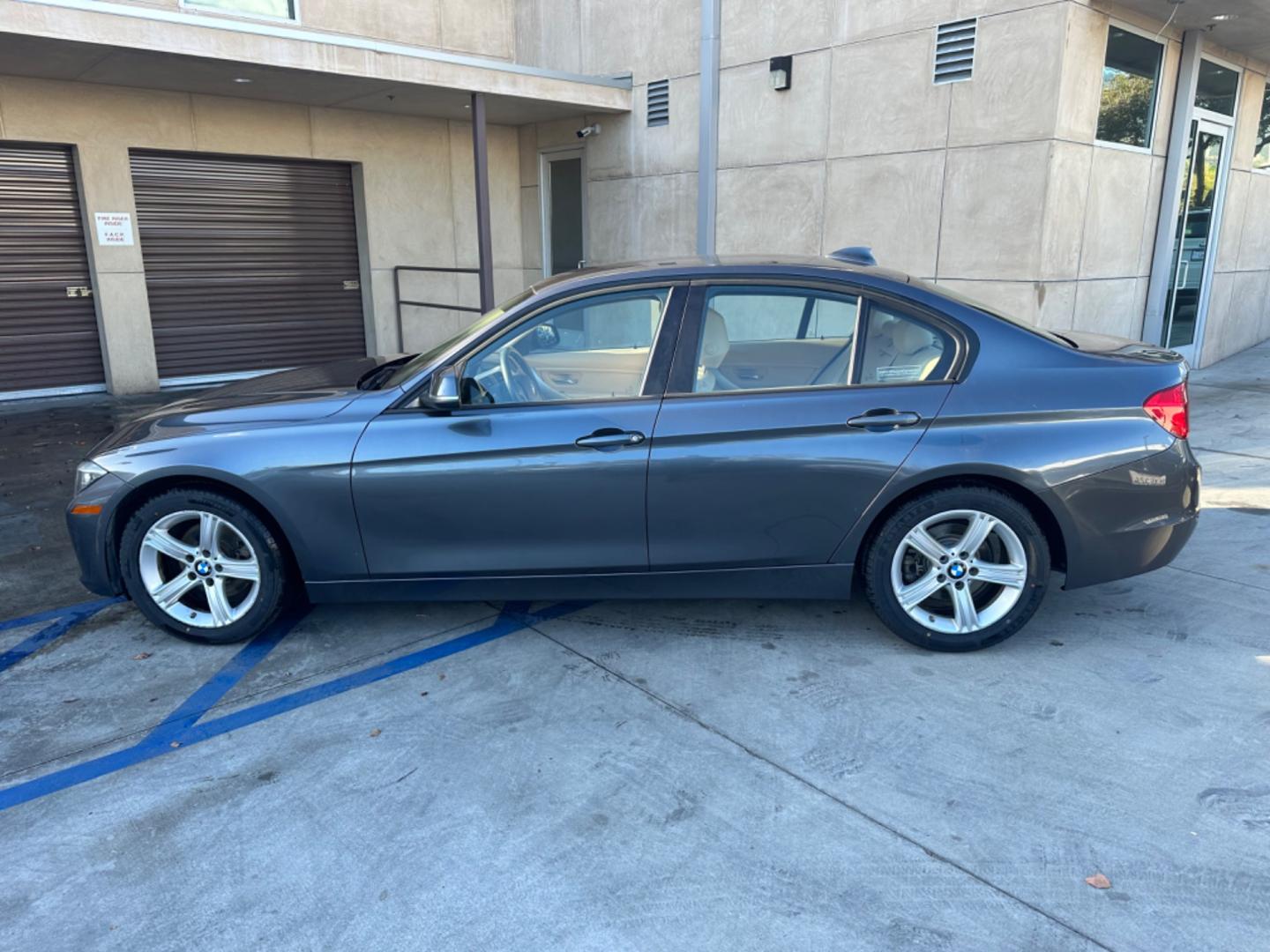 2013 Gray /Black BMW 3-Series (WBA3C1C56DF) with an 4 CYLINDER engine, Automatic transmission, located at 30 S. Berkeley Avenue, Pasadena, CA, 91107, (626) 248-7567, 34.145447, -118.109398 - Elevate Your Drive with the 2013 BMW 328i Sedan - A Gem with low Miles in Pasadena, CA Step into the world of luxury and performance with the 2013 BMW 328i Sedan, now available at our BHPH dealership in Pasadena, CA. With 86,665 miles on the odometer, this vehicle is a testament to BMW's enduring - Photo#1